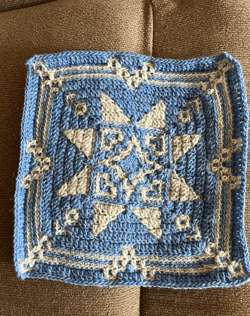 8-petal Icelandic rose design on a mosaic square